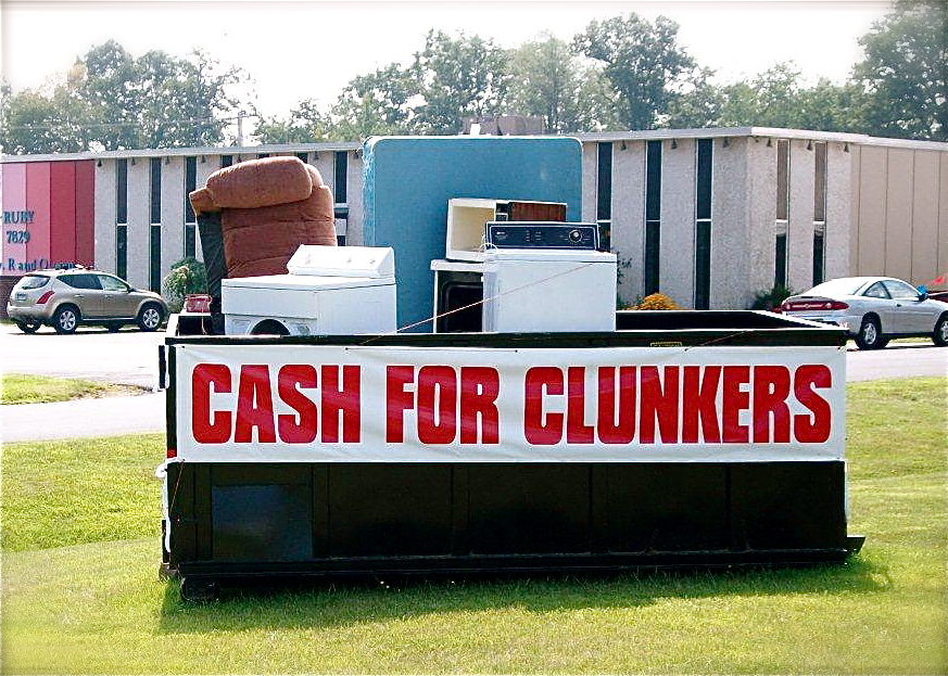 The Cash For Clunkers dumpster out front.