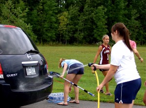 Gloversville High School car wash Field Hockey team Ruby & Quiri